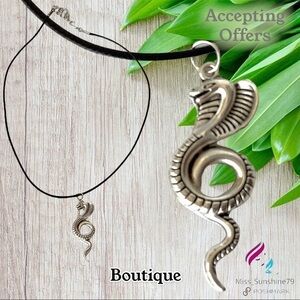 Boutique - snake cobra Tibetan silver pendant on braided leather necklace
